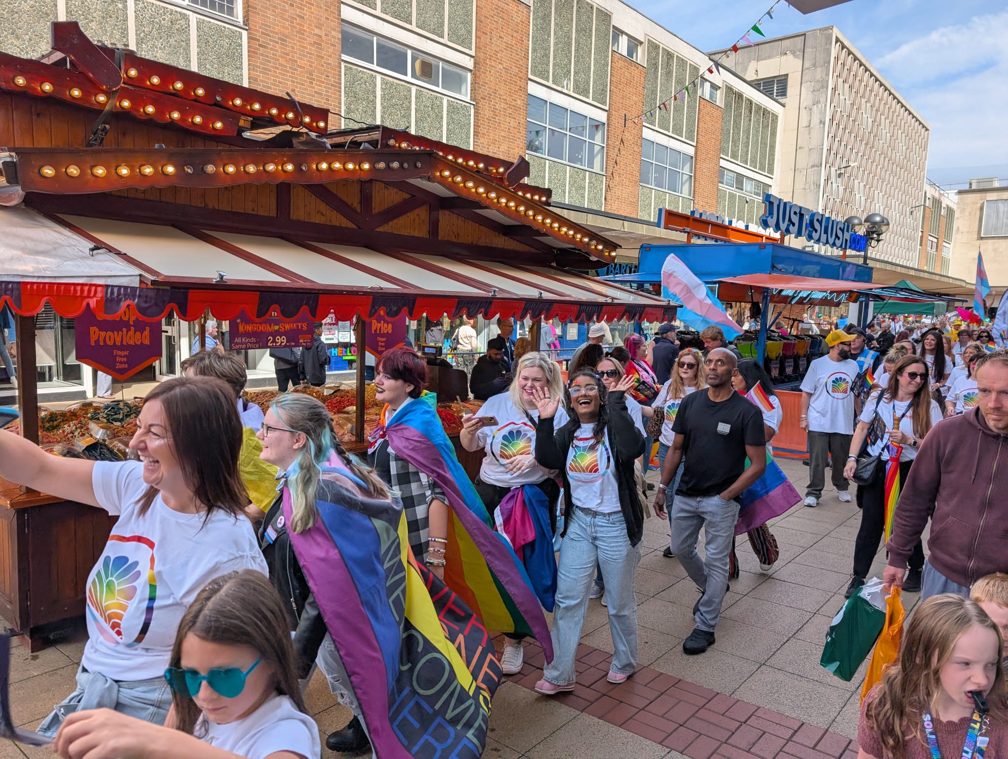Staff and students taking part in the walking parade at last year's Pride event